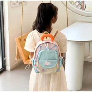 Cute color block children backpack for kindergarten students, stylish and lightweight school bag.