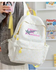 Detail view of Japanese anime style polka dot backpack with star pendant and large capacity.