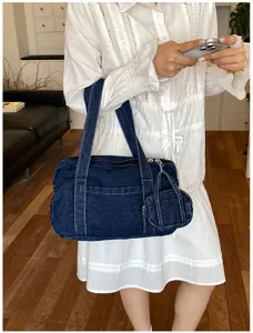 Distressed washed denim tote bag for women, retro casual commuter shoulder bag with pouch.