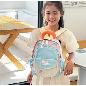 Cute color-blocked children backpack for kindergarten girls with lovely strawberry patch.