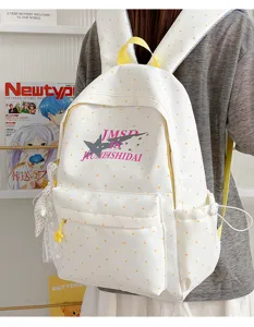 Japanese cute polka dot large capacity school backpack with star print and pockets for students.