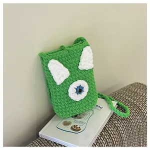 Handmade crochet cartoon green phone crossbody bag, cute one-eye design for daily travel.