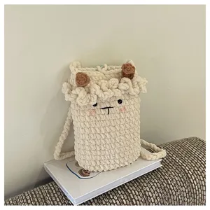 Handmade crochet cute cartoon phone bag detail, soft wool knit daily crossbody bag.