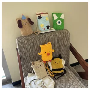 Cute handmade crochet cartoon phone bag, versatile cross-body shoulder bag for travel.