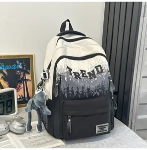 Gradient student backpack with large capacity, stylish letter print and convenient multi-pocket design.