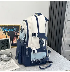 Detail view of the stylish gradient letter print canvas school backpack for students.