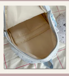 Niedlicher Studenten-Schulrucksack mit Sternenmuster, großem Fassungsvermögen und Fächern.