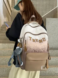 New gradient letter large capacity school backpack for girls, stylish and comfortable daily bag.