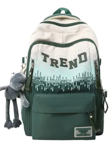 Gradient student backpack with large capacity and cute frog pendant for daily school commuting.