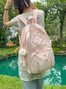 Japanese style cute pink student backpack with drawstring and large capacity for school girls.