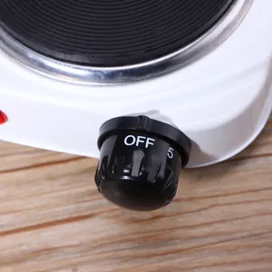 Gros plan détaillé du bouton de commande de la plaque chauffante électrique avec réglage.