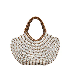 Sac cabas en perles tissé à la main avec pochette blanche, sac à main de plage ajouré pour femmes.