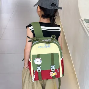 Detailed view of the colorful kids backpack with color blocking and cute patches.