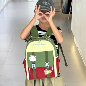 Kids colorblock school backpack detail view, cute toddler daypack with lovely patches.
