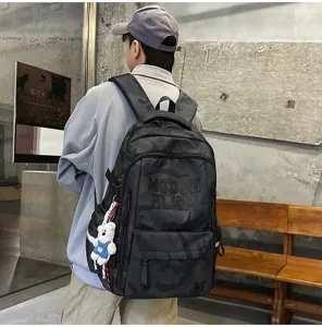 Detailed side angle view showcasing the trendy black camo large capacity school backpack.