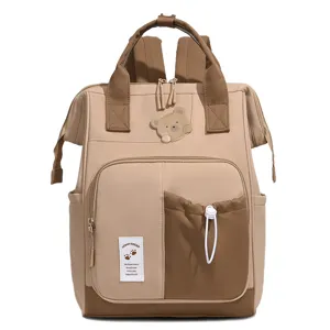 Casual khaki colorblock backpack with cute bear patch, large capacity travel diaper bag detail.