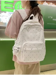 Sac à dos en toile blanche à pois de style collège pour les étudiants et les voyages.