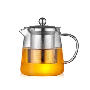 Teiera in vetro trasparente resistente al calore con infusore e coperchio in acciaio inossidabile.