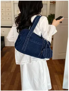 Retro denim shoulder bag for women, vintage washed casual tote bag with mini pouch detail.
