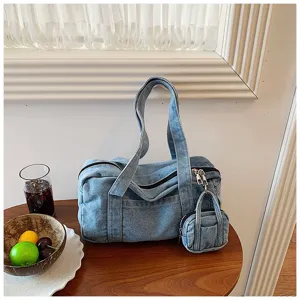 Retro distressed washed denim shoulder bag detail, casual daily underarm tote with mini pouch.