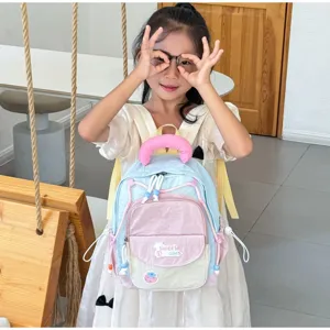 Cute color-blocked kids backpack detail, showing sweet dreams front pocket design clearly.