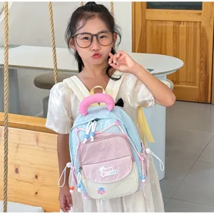 Cute color-blocking kids backpack for kindergarten girls, stylish and lightweight school bag.