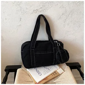 Black denim tote bag with contrast white stitching, retro casual shoulder bag with pouch.