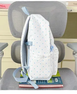 Japanese style white and blue polka dot canvas school backpack large capacity casual daypack.