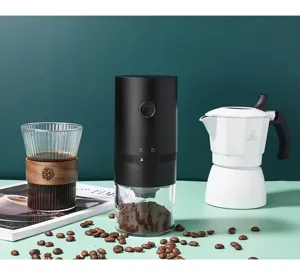 Electric coffee grinder with adjustable coarseness and USB rechargeable design for home use.