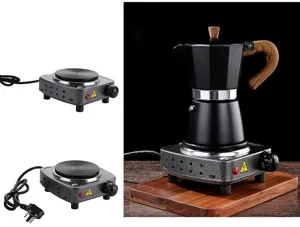 Detail view of mini electric heating stove for tea coffee making, portable hot plate.