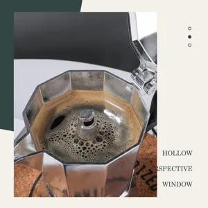 Classic aluminum Italian moka pot, stovetop espresso maker with open lid showing coffee extraction process.