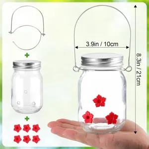 Macro view showing hummingbird feeder dimensions and components with red flower ports.