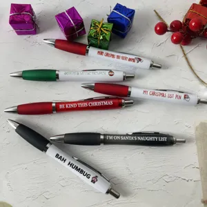 Close-up detail of 6-pack Christmas novelty ballpoint pens with funny holiday text designs.