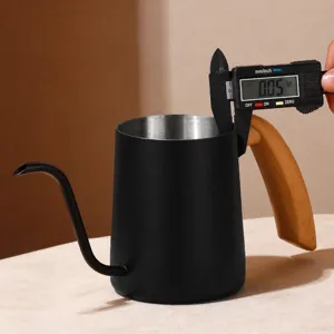 Stainless steel gooseneck pour over coffee kettle with wooden handle for home brewing.
