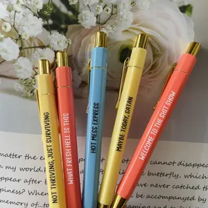 Set de bolígrafos retráctiles divertidos con clips metálicos y frases sarcásticas para oficina.