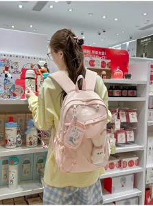 Rosa Schulrucksack mit transparenter Vordertasche und grossem Fassungsvermoegen fuer Schueler.
