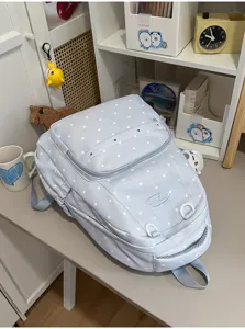 Joli sac à dos scolaire à pois pour filles, grand sac de voyage élégant et pratique.