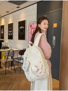 Süßer College-Rucksack mit transparentem Herz und Plüschhase für Schüler und den Alltag.