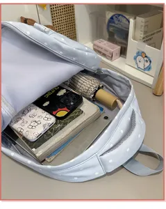 Sac à dos bleu à pois décontracté grande capacité cartable d'école pour voyage.