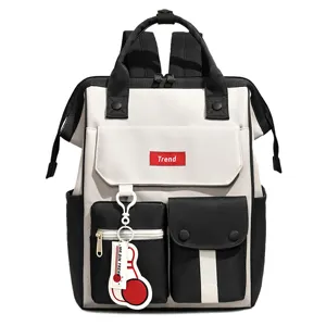 Closeup of casual color-block large capacity backpack detail, multi-pocket design, stylish.