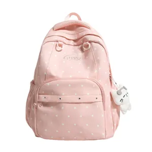 Sac à dos rose à pois pour l'école et le voyage, style collège mignon, grande capacité pour femmes.