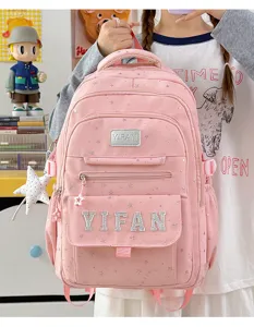 Rosa Schulrucksack aus Stoff mit Sternenmustern und Buchstaben, grosser Kapazität für Jugendliche.