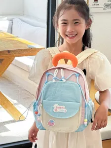 Cute color-block kids backpack with sweet dreams patch, casual school bag for girls.