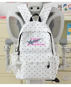 Japanese style polka dot canvas school backpack with star print and large capacity for students.