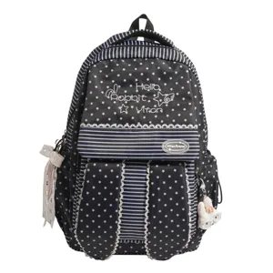 Sac à dos style Harajuku japonais étoiles et rayures noires avec oreilles de lapin et dentelle.