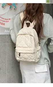 Casual quilted backpack for women, stylish striped school bag and daily commuting daypack.