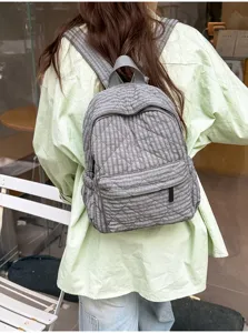 Grey plaid quilted backpack for women, casual school bookbag and commuter daypack.