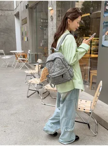 Stylish grey quilted lightweight backpack for women daily casual campus commuting use.
