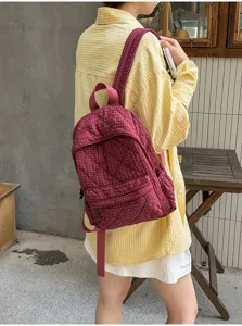 Casual plaid quilted backpack for women, lightweight school bag and commuter daypack.