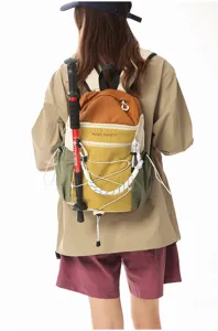 Colorblock outdoor hiking backpack with trekking pole accessory, lightweight daily commute daypack.